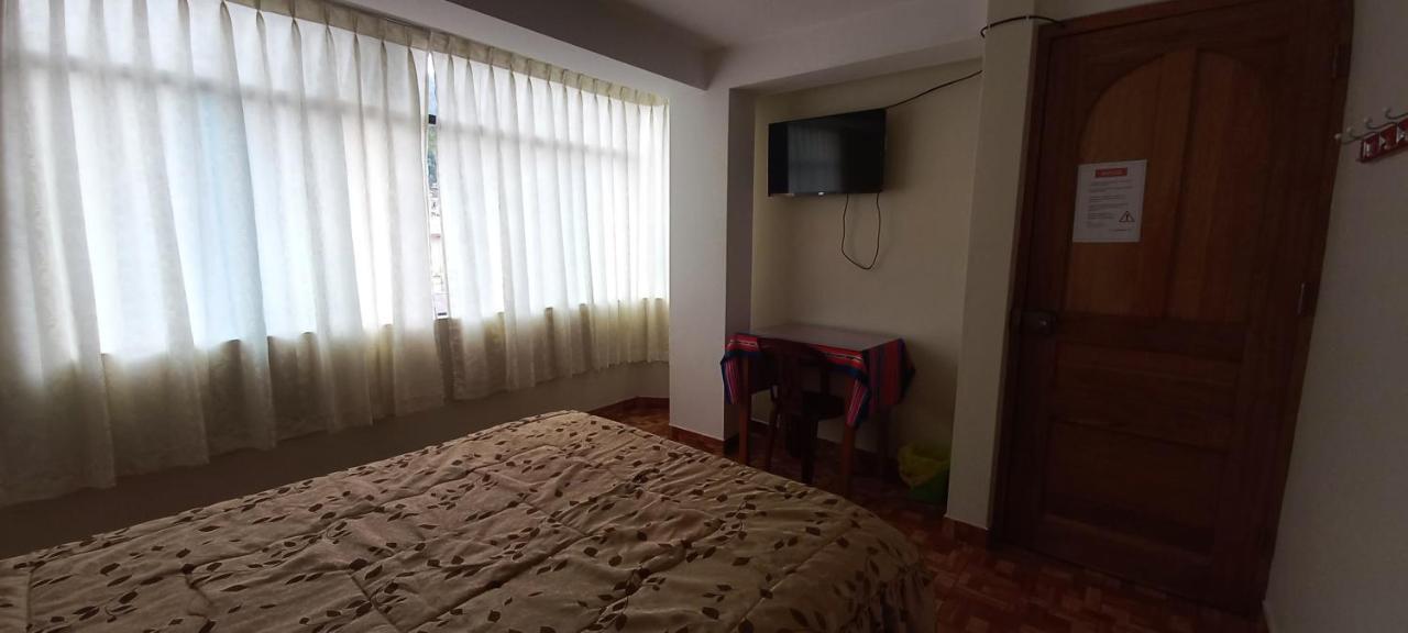 Hospedaje Santa Cruz II Сикуани Экстерьер фото